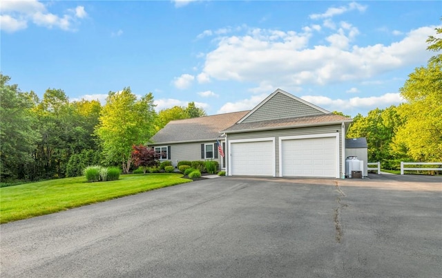 162 Pine Orchard Rd, Glocester, RI 02814 - ranch-style house featuring an attached garage and asphalt driveway