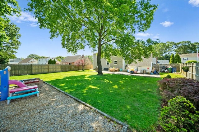 79 Pilgrim Dr, Warwick, RI 02888 - view of yard with a patio
