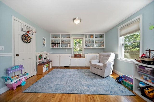 79 Pilgrim Dr, Warwick, RI 02888 - living area with light wood-type flooring and baseboards