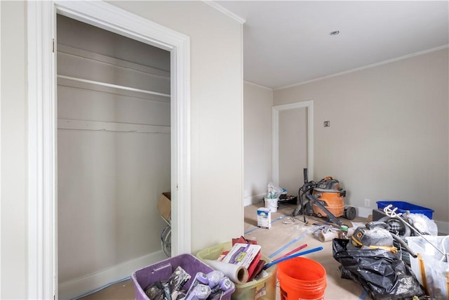 35 Laurel St, Pawtucket, RI 02860 - unfurnished bedroom featuring crown molding and a closet