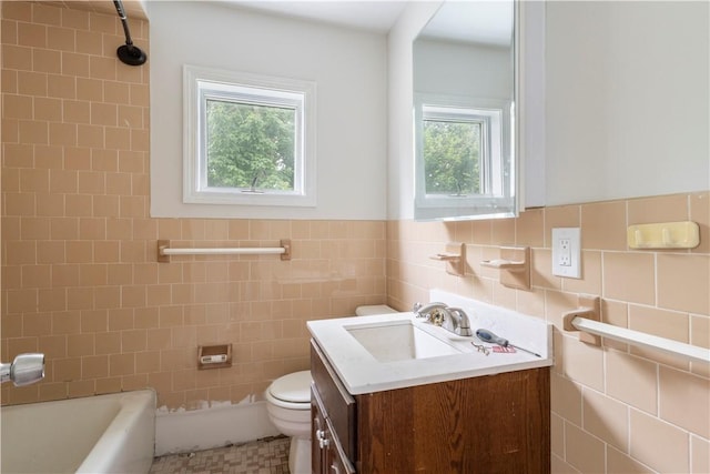 35 Laurel St, Pawtucket, RI 02860 - full bathroom featuring plenty of natural light, vanity, toilet, tile walls, and shower / tub combination