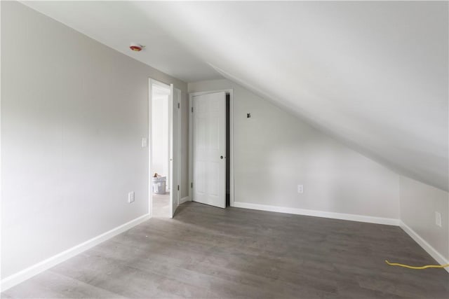 35 Laurel St, Pawtucket, RI 02860 - additional living space featuring vaulted ceiling, wood finished floors, and baseboards