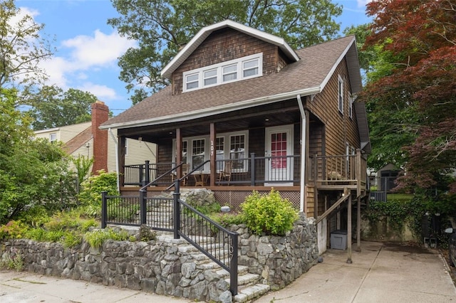 107 Sheffield Ave, Pawtucket, RI 02860 - view of front of home featuring a porch, a shingled roof, and stairway