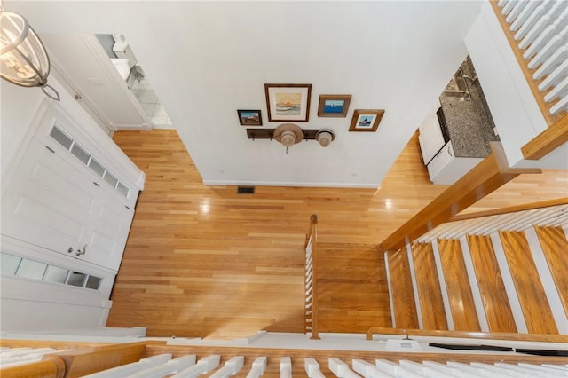 83 Waters Edge St Unit 24, Tiverton, RI 02878 - staircase with wooden walls and wood finished floors
