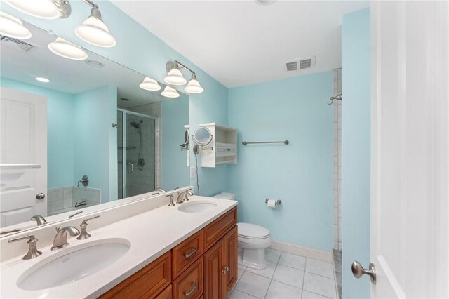 83 Waters Edge St Unit 24, Tiverton, RI 02878 - full bath with a shower stall, toilet, tile patterned flooring, double vanity, and baseboards