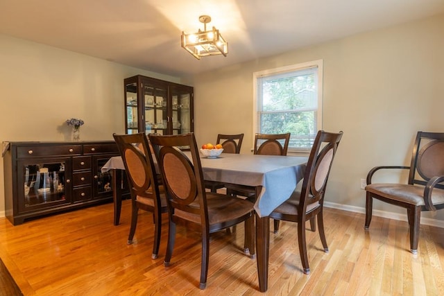 21 Baldwin Rd, Warwick, RI 02886 - dining space with light wood-style flooring and baseboards