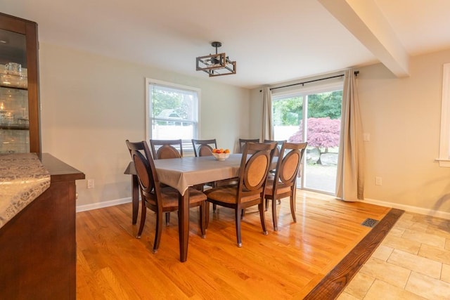 21 Baldwin Rd, Warwick, RI 02886 - dining space with baseboards and light wood-style floors