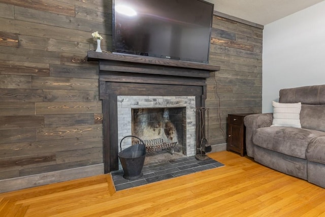21 Baldwin Rd, Warwick, RI 02886 - living room with wood walls, a fireplace with flush hearth, and wood finished floors