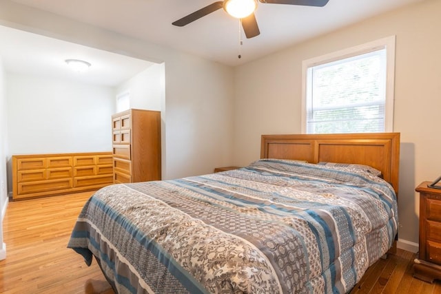 21 Baldwin Rd, Warwick, RI 02886 - bedroom featuring wood finished floors, a ceiling fan, and baseboards