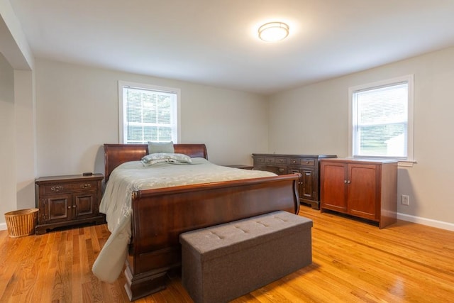 21 Baldwin Rd, Warwick, RI 02886 - bedroom with light wood finished floors and baseboards