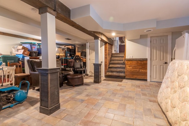 21 Baldwin Rd, Warwick, RI 02886 - finished basement with stone tile floors, stairway, and freestanding refrigerator