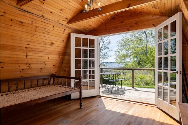 137 Cove Pt E, Charlestown, RI 02813 - entryway featuring wood walls, wood ceiling, hardwood / wood-style flooring, french doors, and a water view