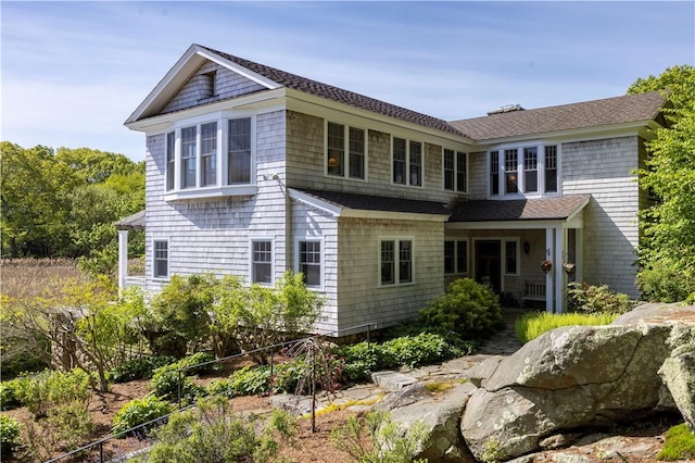 137 Cove Pt E, Charlestown, RI 02813 - back of house with a shingled roof