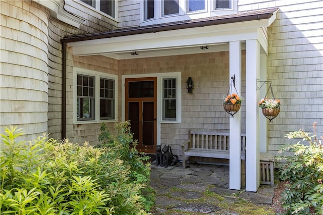 137 Cove Pt E, Charlestown, RI 02813 - view of exterior entry with a porch