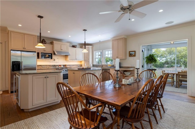 137 Cove Pt E, Charlestown, RI 02813 - dining room featuring crown molding, light wood finished floors, recessed lighting, and a ceiling fan