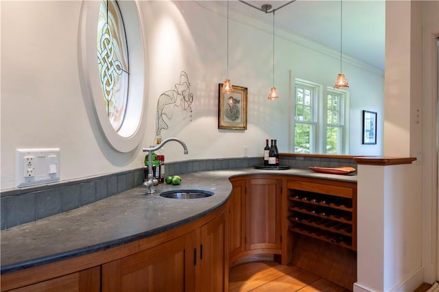 137 Cove Pt E, Charlestown, RI 02813 - indoor bar featuring ornamental molding and decorative light fixtures