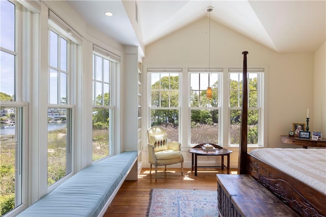 137 Cove Pt E, Charlestown, RI 02813 - bedroom with hardwood / wood-style flooring, lofted ceiling, and a water view
