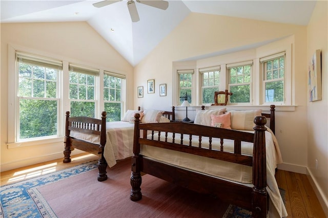 137 Cove Pt E, Charlestown, RI 02813 - bedroom featuring wood finished floors, vaulted ceiling, and a ceiling fan