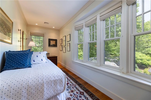 137 Cove Pt E, Charlestown, RI 02813 - bedroom featuring hardwood / wood-style floors and crown molding