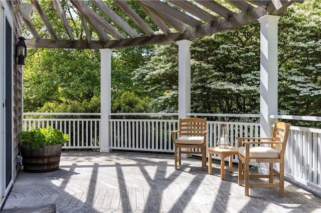 137 Cove Pt E, Charlestown, RI 02813 - wooden terrace featuring a pergola
