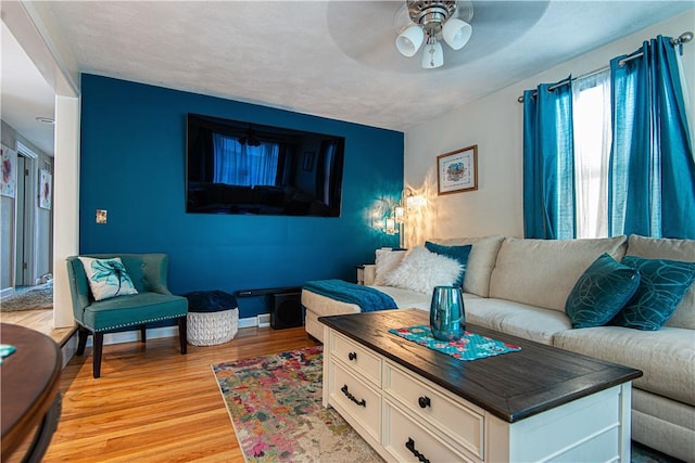 34 Zambarano Ave, North Providence, RI 02911 - living room with light wood finished floors and a ceiling fan