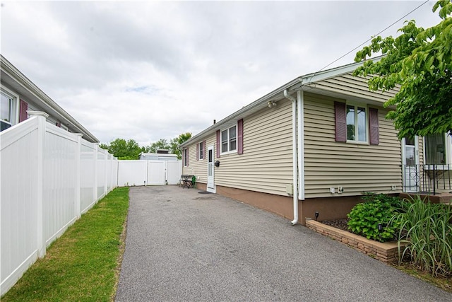 34 Zambarano Ave, North Providence, RI 02911 - view of property exterior with a gate