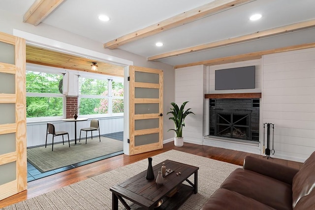 137 Rocky Hill Rd, Scituate, RI 02857 - living room featuring beam ceiling, wood finished floors, a fireplace, and recessed lighting