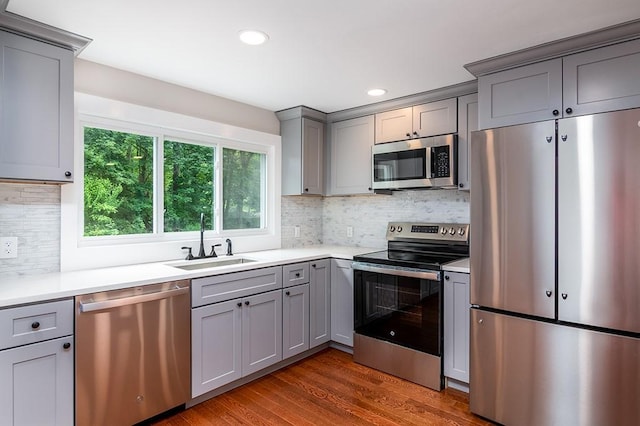 137 Rocky Hill Rd, Scituate, RI 02857 - kitchen with stainless steel appliances, gray cabinets, healthy amount of natural light, and recessed lighting