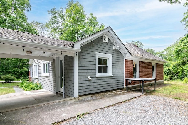 137 Rocky Hill Rd, Scituate, RI 02857 - view of property exterior with a shingled roof