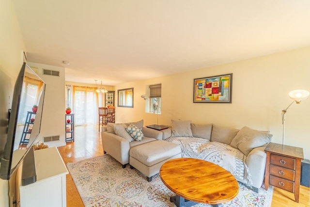 7 Tamarac Dr Unit F, Smithfield, RI 02828 - living area featuring healthy amount of natural light and light wood finished floors
