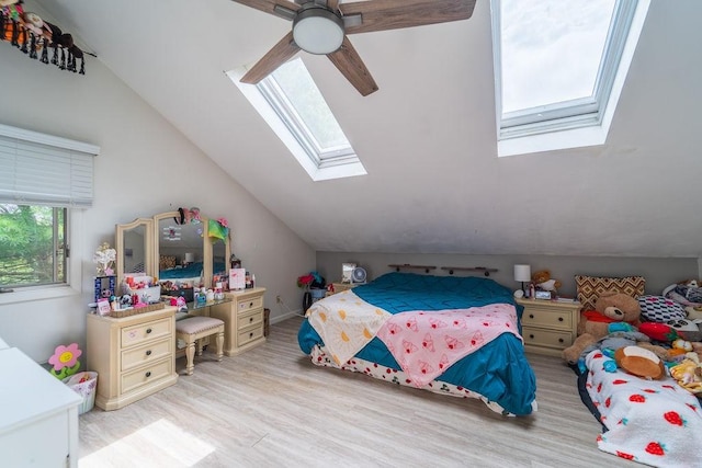7 Tamarac Dr Unit F, Smithfield, RI 02828 - bedroom with a skylight, vaulted ceiling, light wood-style flooring, and ceiling fan