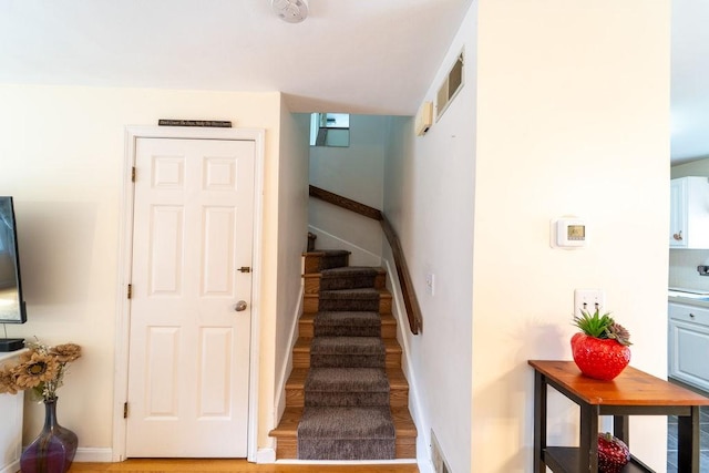 7 Tamarac Dr Unit F, Smithfield, RI 02828 - staircase with wood finished floors and baseboards