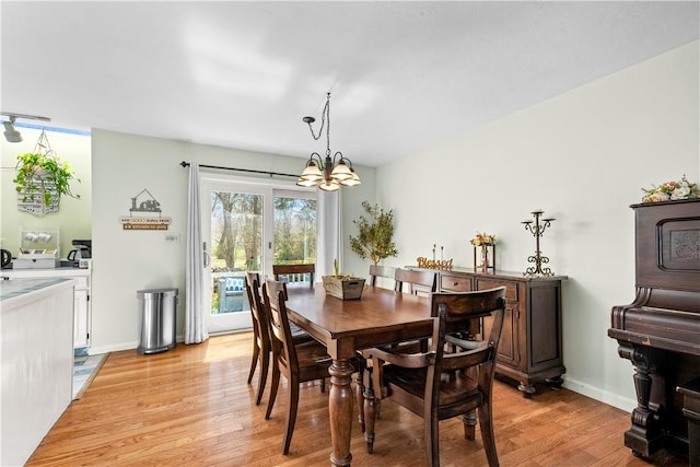 447 Stafford Rd Unit C3, Tiverton, RI 02878 - dining room featuring light wood-style floors and a chandelier