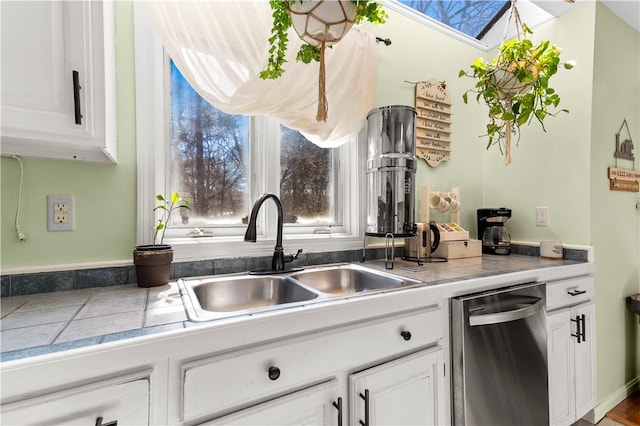 447 Stafford Rd Unit C3, Tiverton, RI 02878 - kitchen with dishwasher, white cabinets, plenty of natural light, and a skylight