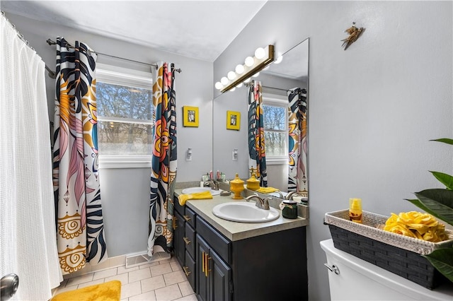 447 Stafford Rd Unit C3, Tiverton, RI 02878 - full bath featuring vanity, plenty of natural light, and tile patterned floors