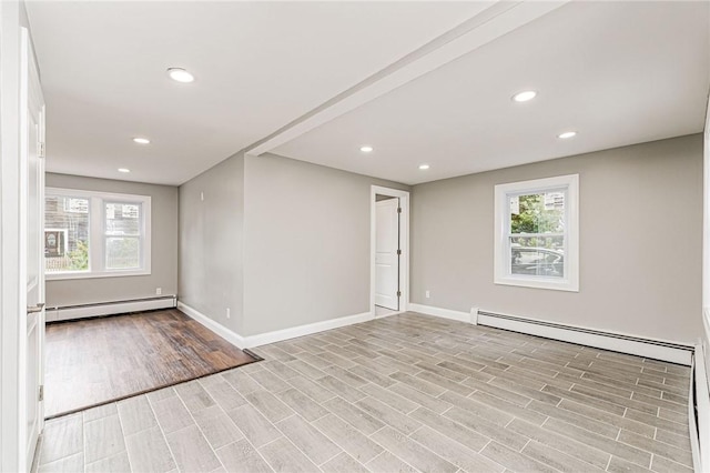 65 Harrop Ave, Warwick, RI 02886 - spare room with baseboard heating, healthy amount of natural light, light wood-style floors, and recessed lighting