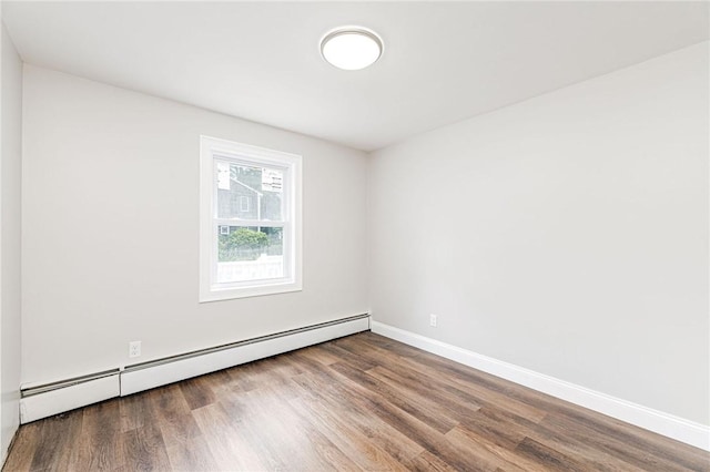 65 Harrop Ave, Warwick, RI 02886 - unfurnished room with a baseboard radiator and wood finished floors