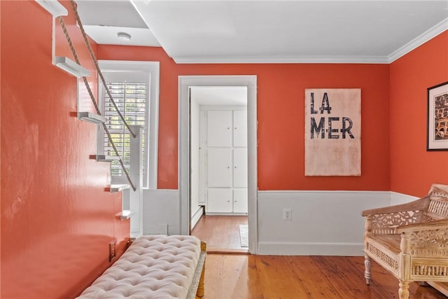 35 Second St, Newport, RI 02840 - entryway with hardwood / wood-style flooring, stairway, a baseboard radiator, and crown molding