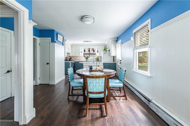 40 Highland St, Pawtucket, RI 02860 - dining space featuring baseboard heating and dark wood-style flooring