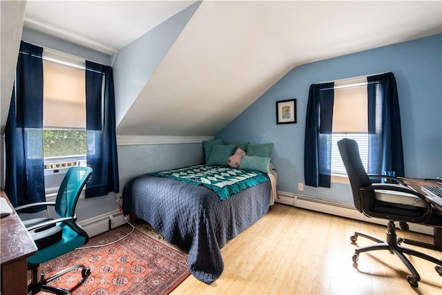 40 Highland St, Pawtucket, RI 02860 - bedroom featuring wood finished floors, baseboard heating, a desk, and lofted ceiling