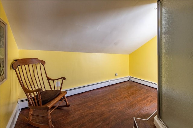 40 Highland St, Pawtucket, RI 02860 - sitting room with vaulted ceiling, wood finished floors, and a baseboard radiator