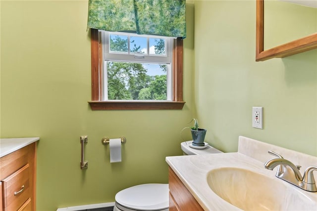 373 Fletcher Rd, North Kingstown, RI 02852 - bathroom featuring vanity, healthy amount of natural light, and baseboard heating