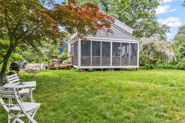 373 Fletcher Rd, North Kingstown, RI 02852 - view of green lawn featuring a sunroom