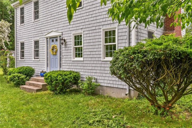 373 Fletcher Rd, North Kingstown, RI 02852 - property entrance with a lawn