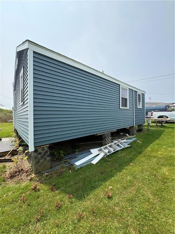 854 Matunuck Beach Rd, South Kingstown, RI 02879 - view of side of property with a yard