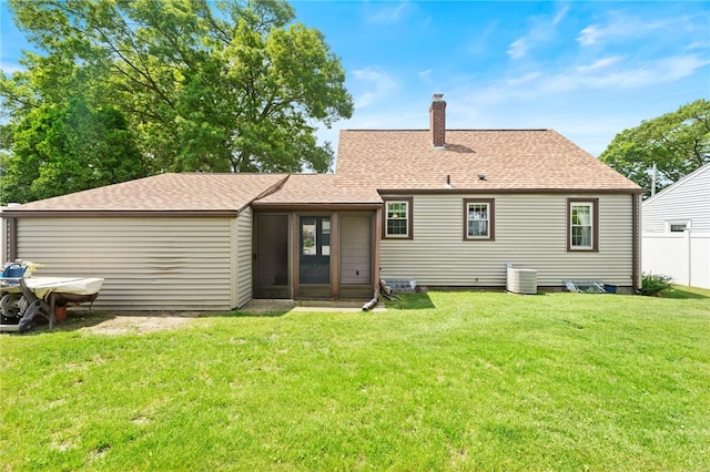 59 Massachusetts Ave, Warwick, RI 02888 - back of house with a chimney, a sunroom, and a shingled roof