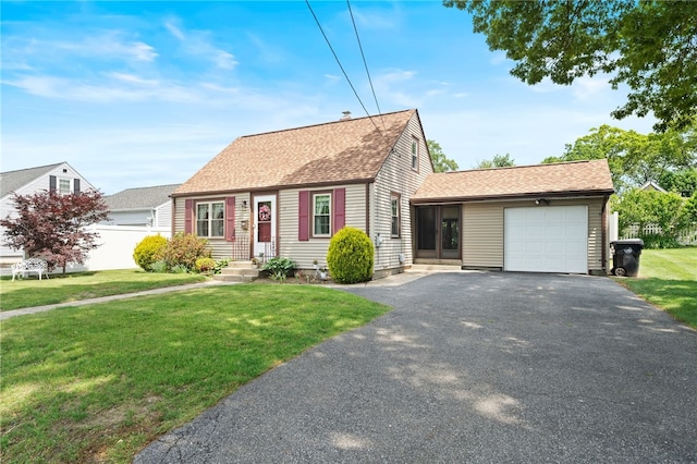 59 Massachusetts Ave, Warwick, RI 02888 - cape cod-style house with an attached garage, asphalt driveway, and roof with shingles