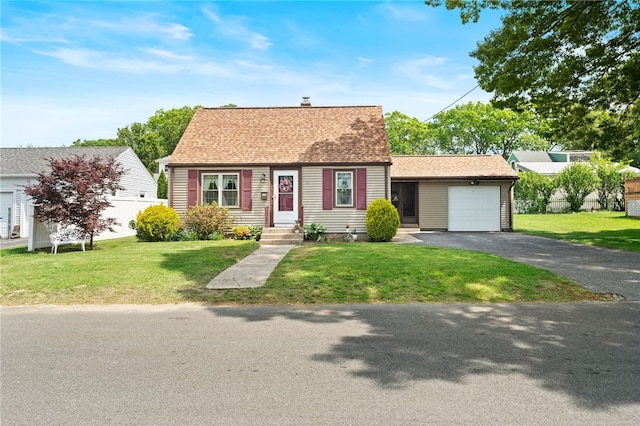 59 Massachusetts Ave, Warwick, RI 02888 - new england style home with an attached garage, driveway, a front yard, a chimney, and roof with shingles