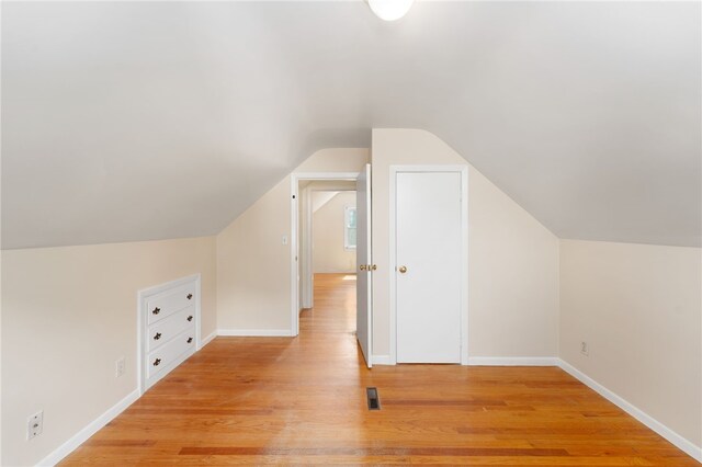59 Massachusetts Ave, Warwick, RI 02888 - additional living space with lofted ceiling and light wood finished floors