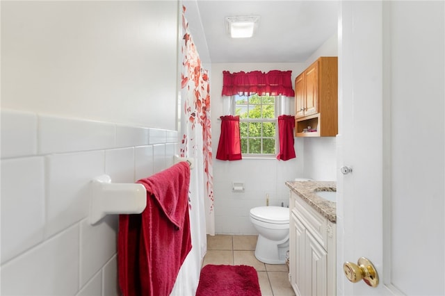 59 Massachusetts Ave, Warwick, RI 02888 - bathroom featuring tile walls, tile patterned flooring, and vanity